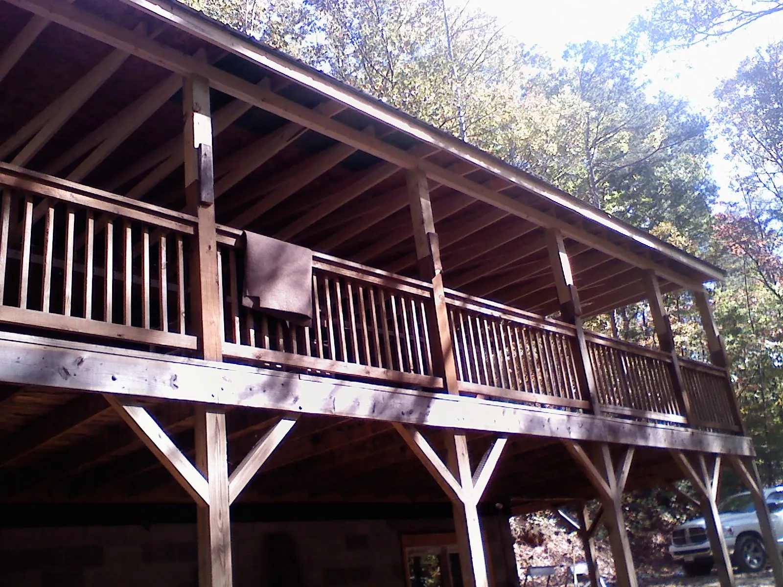 Timber framing under a new elevated porch and deck — Roof Leak Repair in Council Bluffs by Roofing Brothers